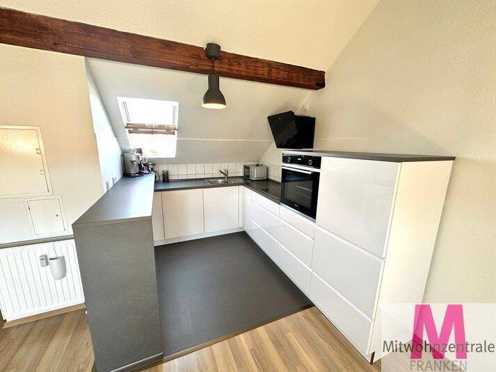 Stilvolles Wohnen unter dem Dach Hochwertig möblierte 2-Zimmer-Wohnung mit sichtbaren Holzbalken – Nürnberg – Vorschaubild 7