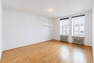 AIGNER - Zwischen Viktualienmarkt und Isartor: 3-Zimmer-Altbauwohnung in Toplage