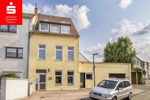 Mehrfamilienhaus mit Büro, Wohnungen, Lager und großer Doppelgarage, für Anleger & Eigennutzer