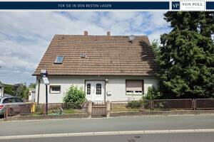 Einfamilienhaus mit Potential und sensationellem Fernblick