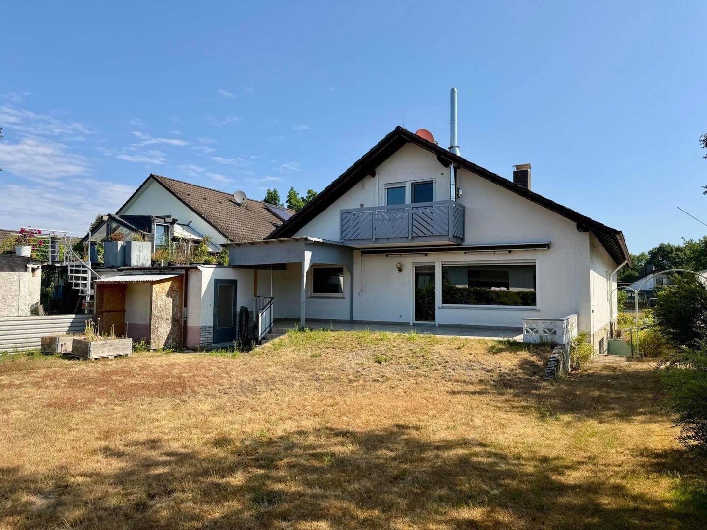 Ein-/ Zweifamilienhaus mit schönem Garten und Garage in gesuchter Wohnlage! – Heusenstamm – Vorschaubild 2