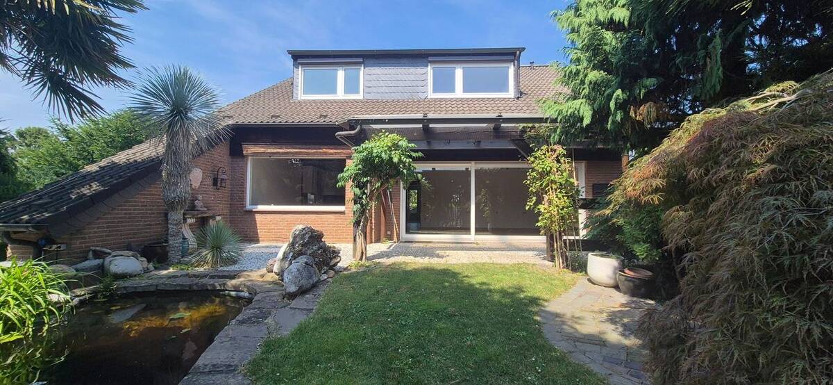 Großzügiges Einfamilienhaus mit Einliegerwohnung und traumhaftem Garten – 51381 Leverkusen – Bild 1 von 9