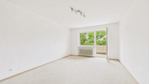 HEGERICH: Vermietete 2-Zimmer-Wohnung mit Südost-Loggia und TG-Stellplatz in Hadern-München