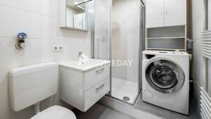 Weitblick über München: lichtdurchflutete 1,5-Zimmer-Wohnung mit Loggia und Tiefgaragenstellplatz – 80995 München – Vorschaubild 7