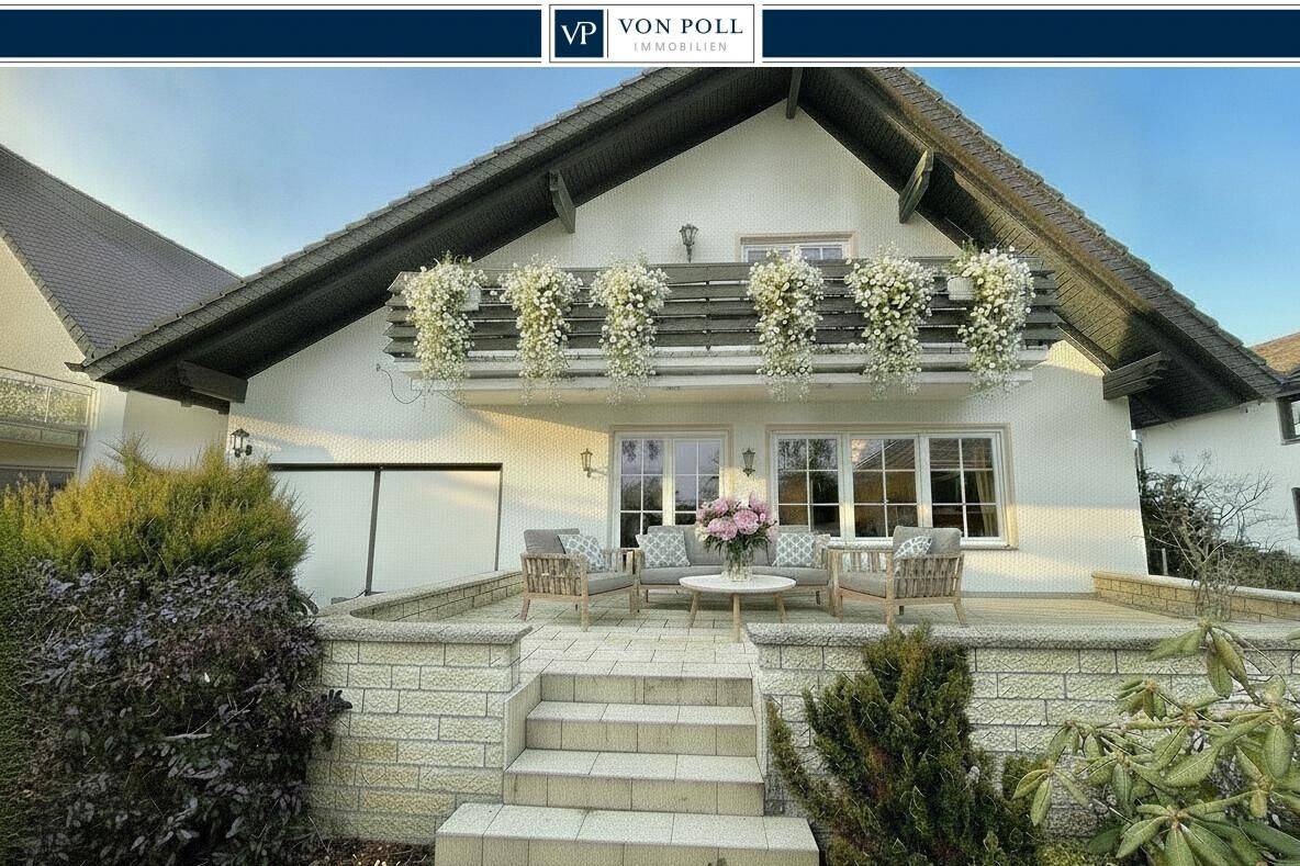 Edles Einfamilienhaus mit lichtdurchflutetem Wohnbereich, sonniger Terrasse und Garten