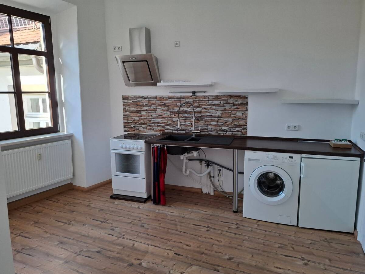 Helle 2-Zimmer-Wohnung am Obermarkt in Freiberg – mit Blick auf die Petrikirche – 9599 Freiberg – Bild 1 von 9