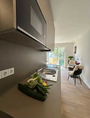 Moderne Neubauwohnung Voll möbliertes 1-Zimmer-Apartment mit Balkon in Darmstadt – 64295 Darmstadt – Vorschaubild 4