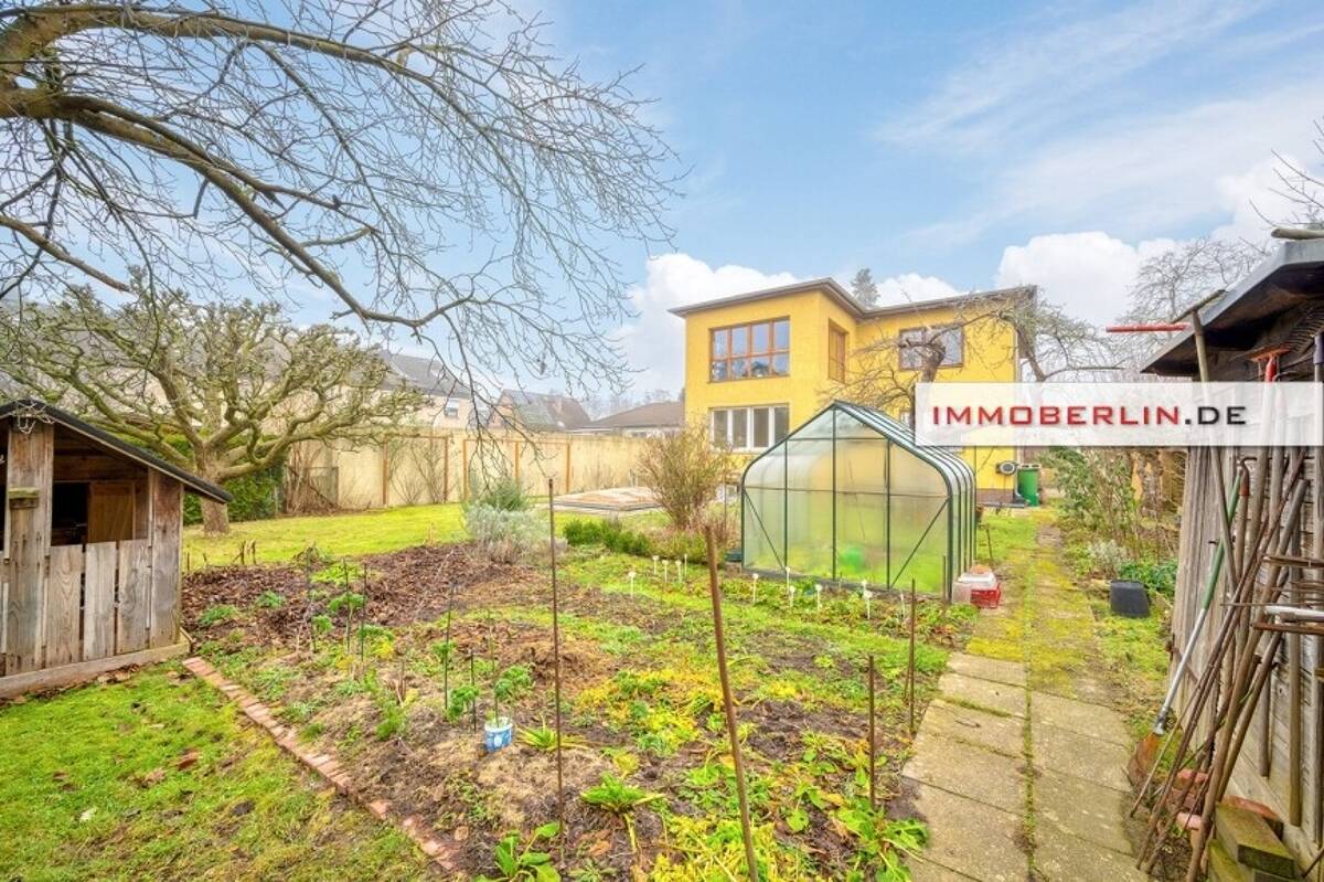 IMMOBERLIN.DE - Wohlfühllage! Attraktiv strukturiertes Ein-/Zweifamilienhaus mit großem Südgarten – 12309 Berlin – Bild 1 von 9