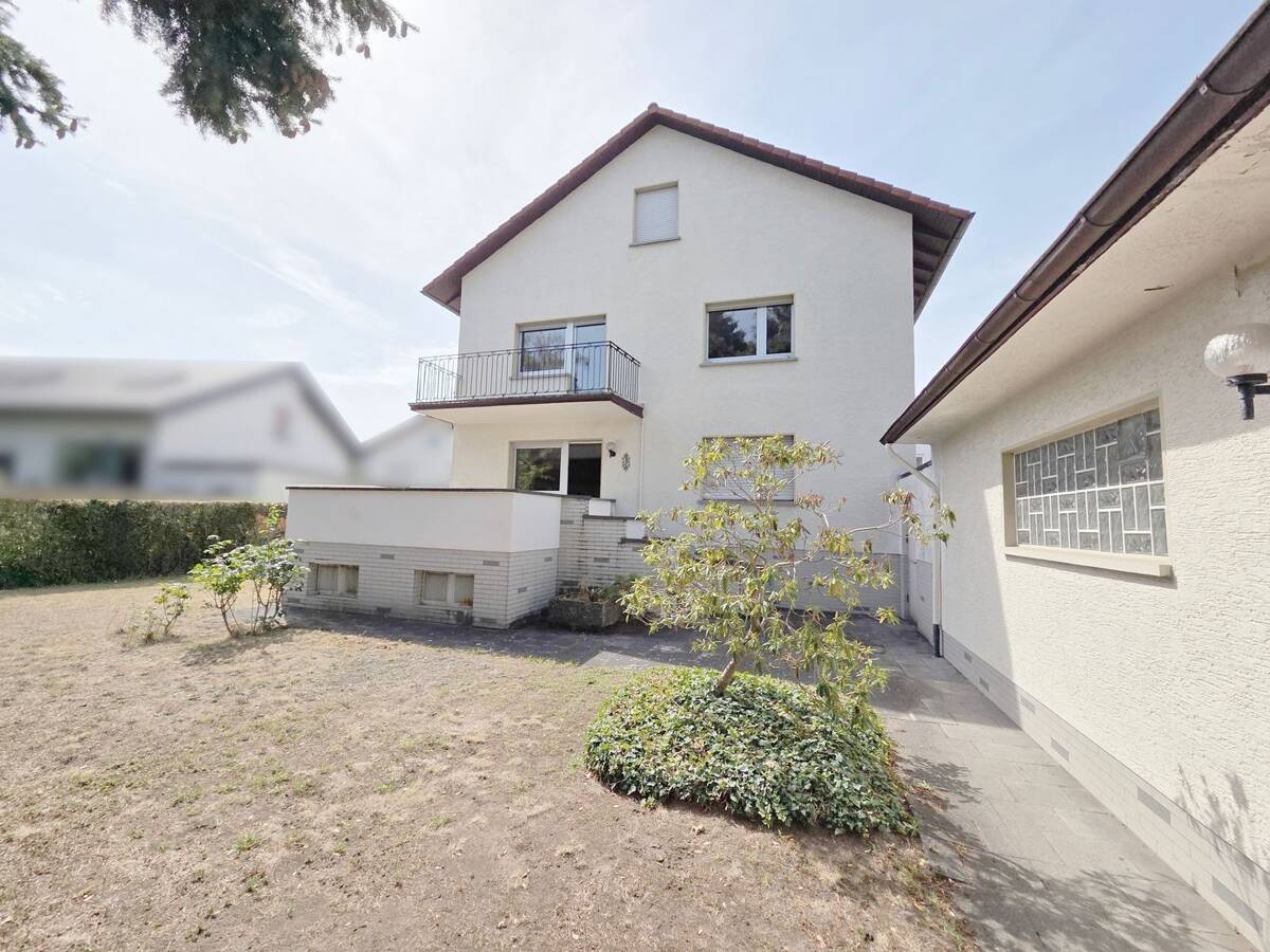 Münster: Platz für die ganze Familie! 2FH mit Garage und großem Grundstück – 64839 Münster – Bild 1 von 9