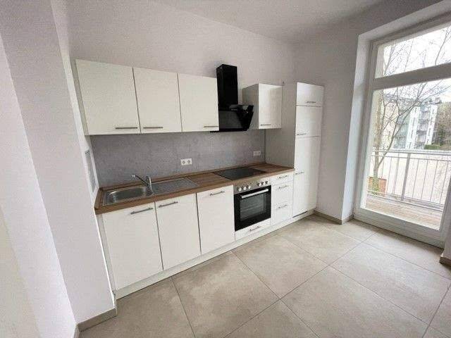 +++MODERNE Wohnung mit Parkett, Fußbodenheizung, Balkon u. Gartenanteil sowie EBK+++