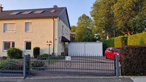 Erdgeschosswohnung mit Terrasse, Garten, Garage plus Stellplatz
