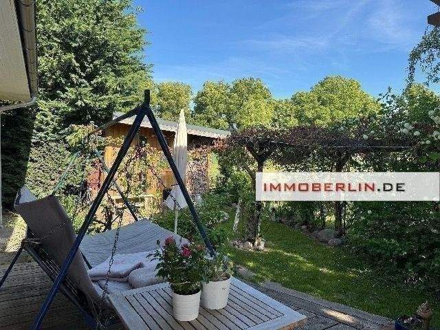 IMMOBERLIN.DE - Wunderbarer Bungalow mit großem Sonnengarten in ländlicher Wohlfühllage – Höhenland – Bild 1 von 9