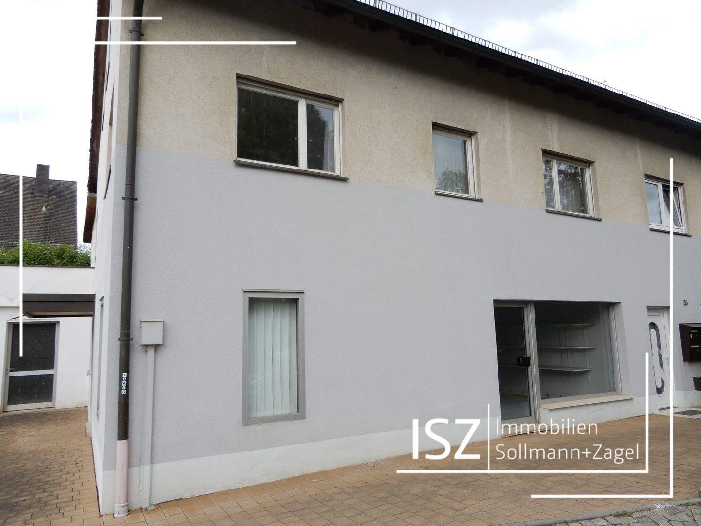 2-Familienhaus ohne Garten, mit Laden, Werkstatt und 2 Garagen, ideal für Handwerksbetrieb – Fürth – Bild 1 von 9