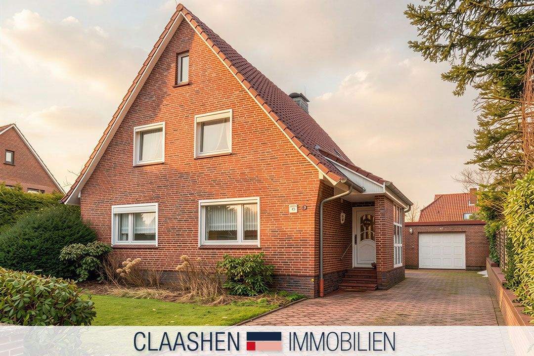 Einfamilienhaus in ruhiger Siedlung mit Garage – Norden – Bild 1 von 9