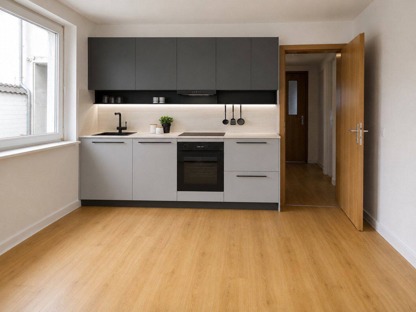 Sanierte Erdgeschoss-Wohnung mit Einbauküche, modernes Bad