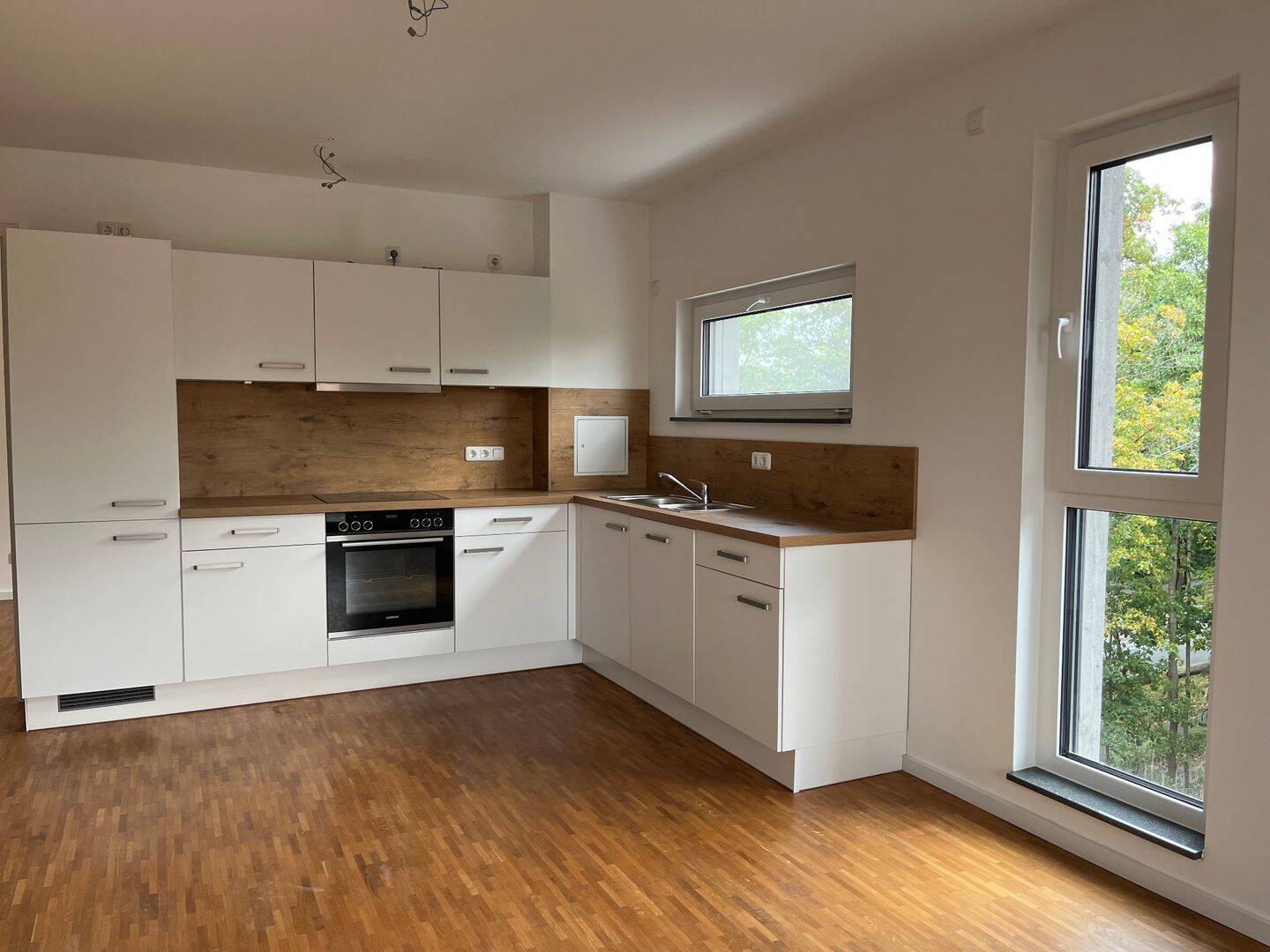 Helle -Zimmer-Neubauwohnung mit Einbauküche wird frei