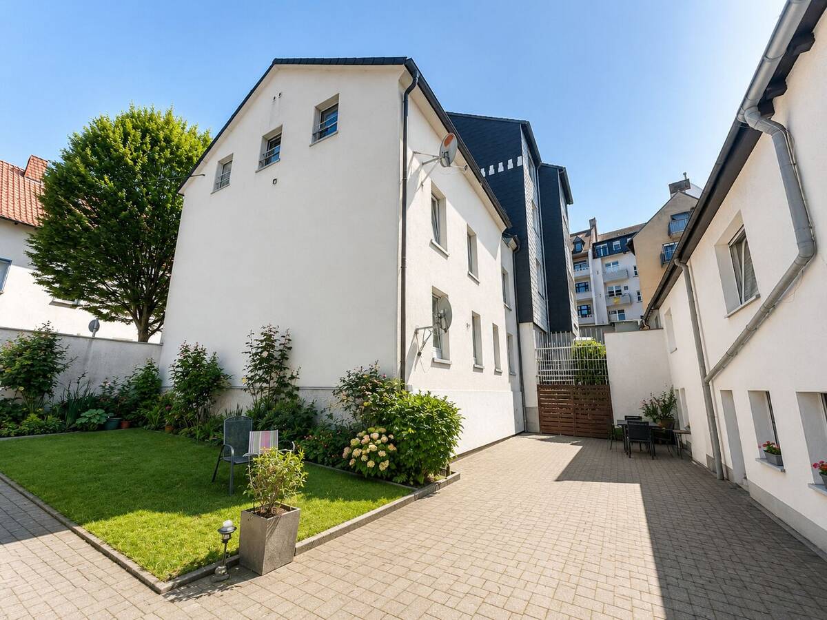 Wohnensemble mit Potenzial: Mehrfamilienhaus & Einfamilienhaus mit Garten und Innenhof – 58089 Hagen – Bild 1 von 9