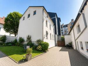Wohnensemble mit Potenzial: Mehrfamilienhaus & Einfamilienhaus mit Garten und Innenhof