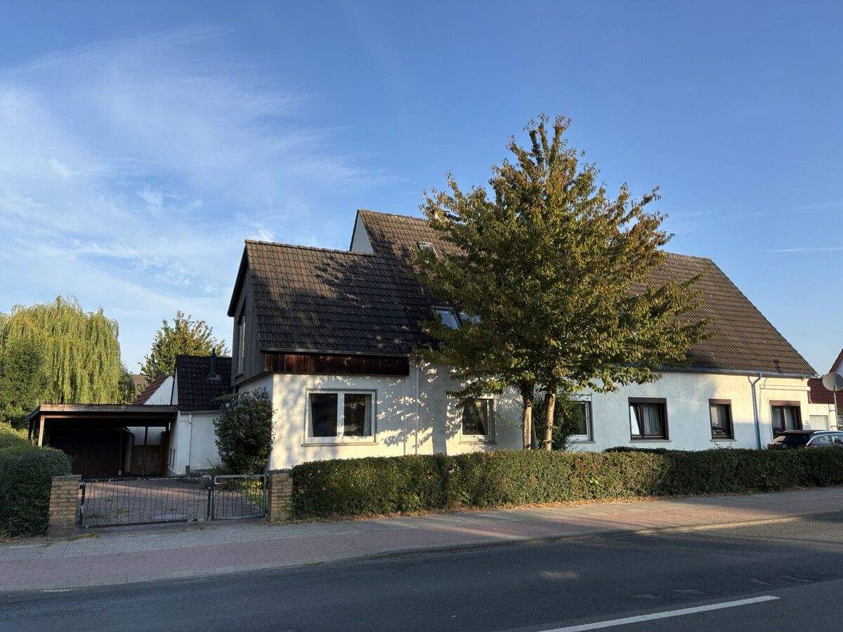 PURNHAGEN-IMMOBILIEN - Großzügige Doppelhaushälfte mit Wintergarten auf großem Grundstück – 28755 Bremen – Bild 1 von 9