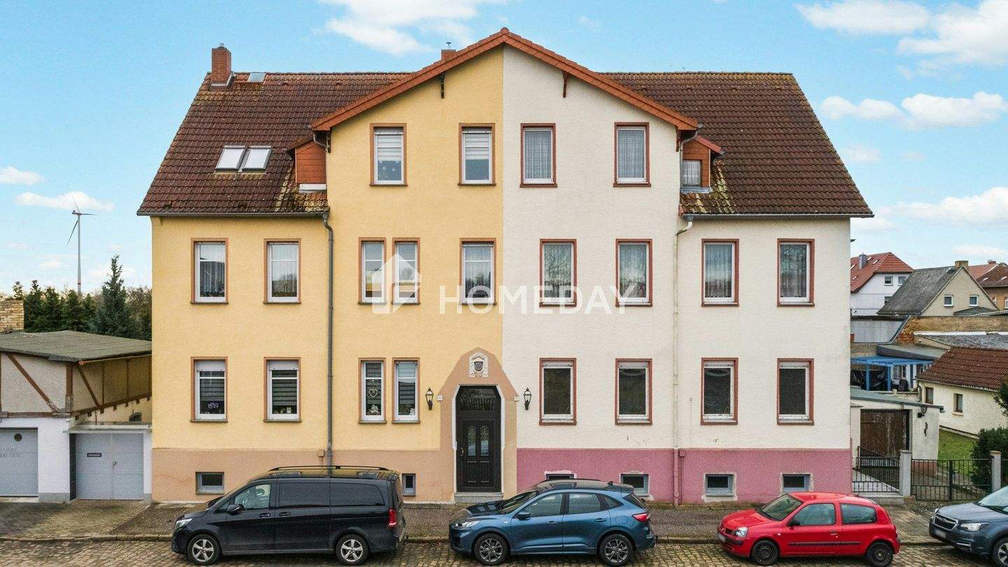 Attraktive Kapitalanlage - sanierte und gut vermietete DHH mit drei Wohneinheiten und Doppelgarage – Lützen – Bild 1 von 9
