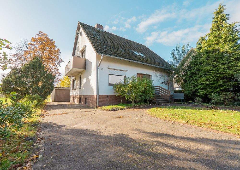 Ihr neues Projekt in Marschacht - Einfamilienhaus mit Einliegerwohnung und viel Potenzial – Marschacht – Bild 1 von 9