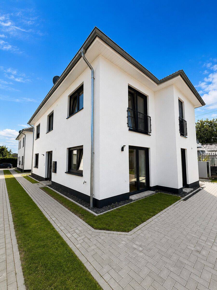 Moderne 3-Zimmer-Neubauwohnung mit Terrasse / 82 m² im Zweifamilienhaus