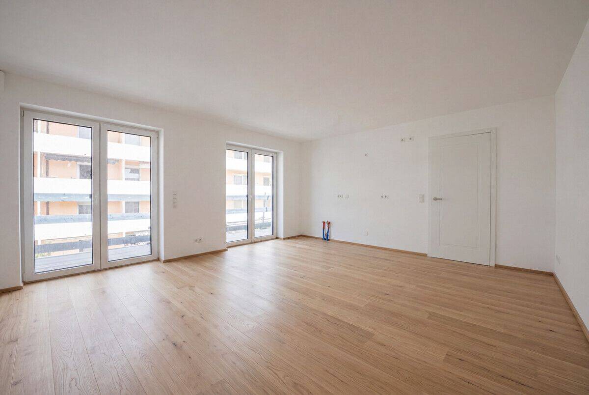 Sonnenverwöhnte Eckwohnung mit umlaufendem Balkon und Tageslicht-Badezimmer - Erstbezug Sept. 2026 – 81369 München – Bild 1 von 9