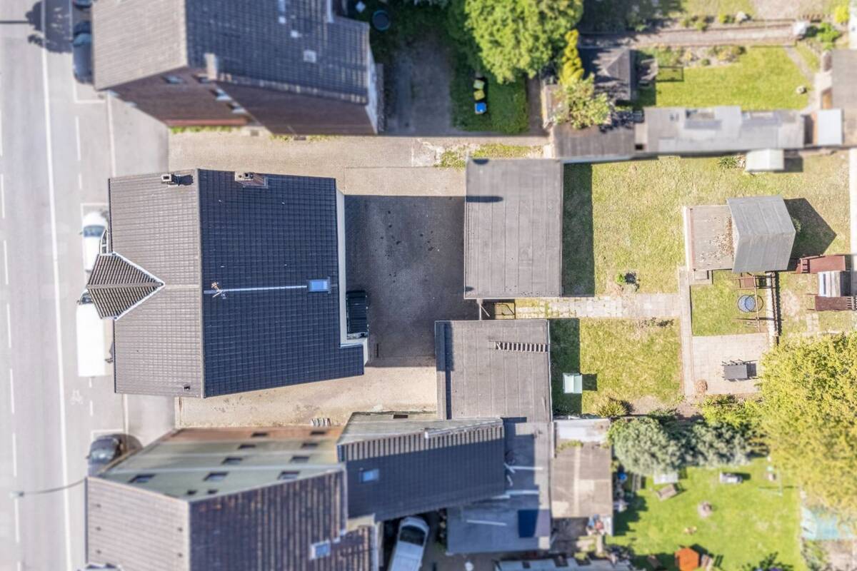 SOLL-Faktor 12! Laufend modernisiertes Mehrfamilienhaus mit 5 Garagen & Mietpotenzial – 44388 Dortmund – Bild 1 von 9