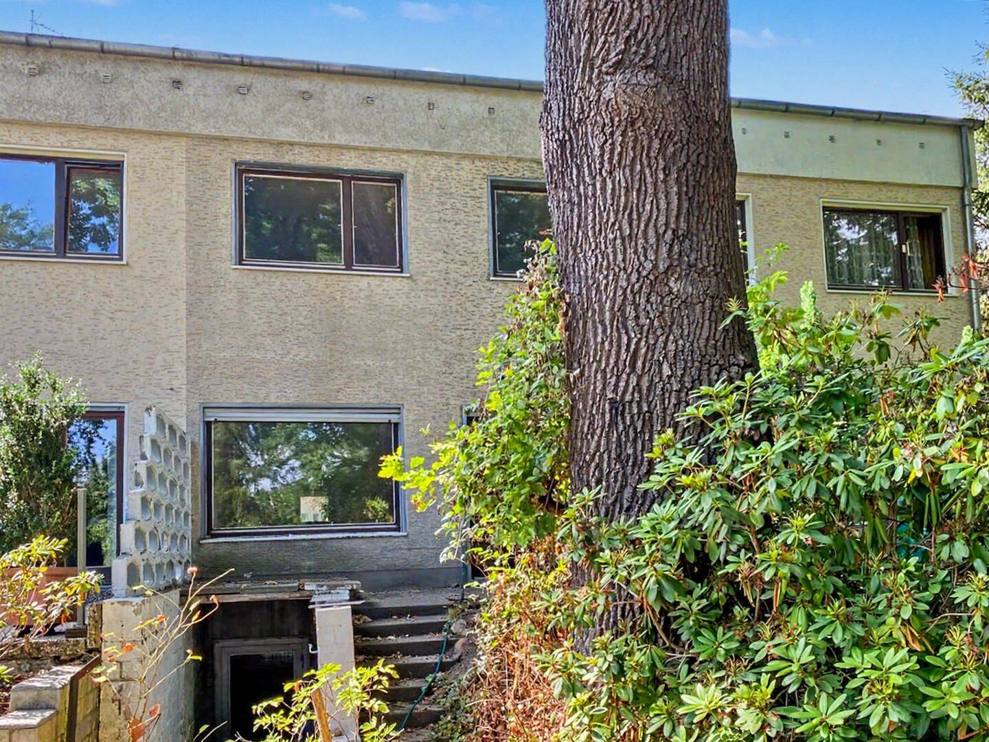 Stark sanierungsbedürftiges Reihenmittelhaus mit 3,5 Zimmern und großem Garten in Berlin- Zehlendorf – Berlin – Vorschaubild 2