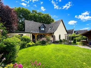Ein Zuhause voller Wohnglück, Qualität und Lebensfreude! Traumhaftes Einfamilienhaus mit Garten, Garage und Wohlfühlambiente