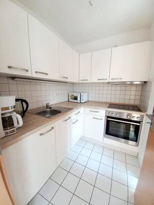 Lichtdurchflutete 1-Zimmer-Wohnung mit moderner Einbauküche & TG-Stellplatz – 9117 Chemnitz – Vorschaubild 4