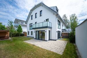 AIGNER - Neuwertige Doppelhaushälfte mit großzügigem Garten und viel Wohnkomfort