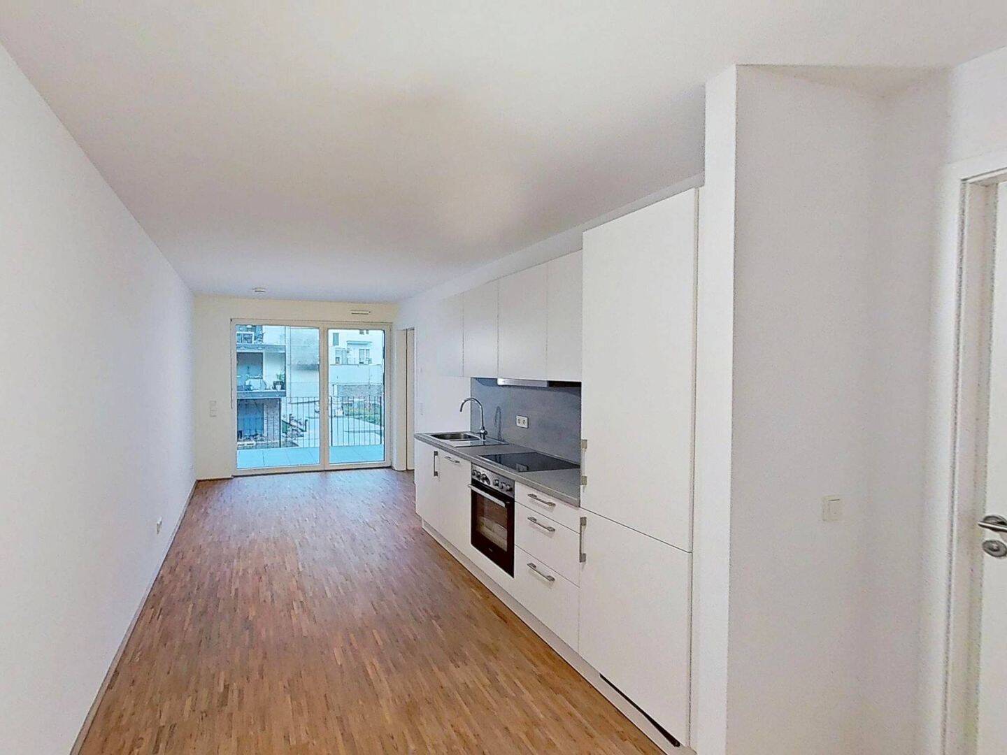 Lichtdurchflutete 2-Zimmer-Neubauwohnung mit Einbauküche und Balkon!
