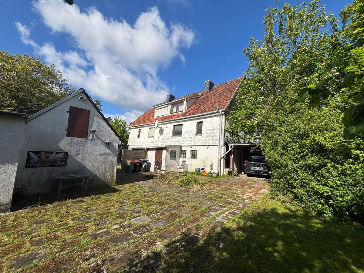 Abrissobjekt: Doppelhaus auf tollem Grundstück in der Siedlung Wohlersweg – 21079 Hamburg – Bild 1 von 9
