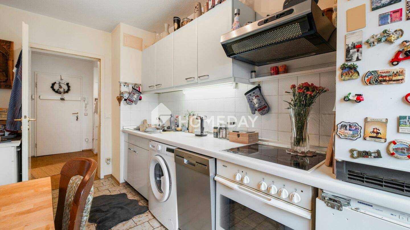 Urbaner Rückzugsort mit Weitblick: Etagenwohnung mit Balkon und Tiefgarage – München – Vorschaubild 5