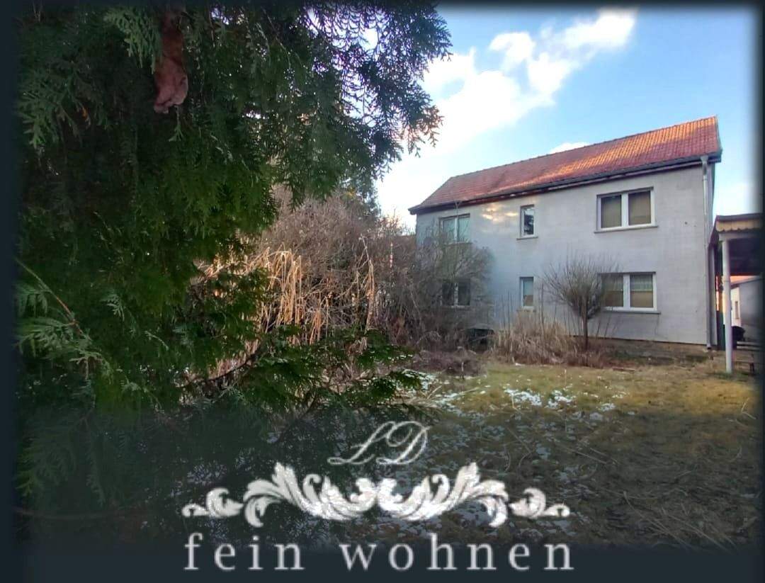 Einfamilienhaus mit großem Carport/Werkstatt, Nebengelass weitläufigem Grundstück inklusive – Ballhausen – Bild 1 von 9