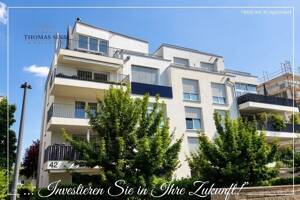 Moderne und lichtdurchflutete 3-Zimmer-Wohnung mit Sonnenbalkon und Tiefgaragenstellplatz