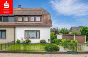Bremen-Arsten: Charmante Doppelhaushälfte mit großem Gartenbereich in ruhiger Wohnlage