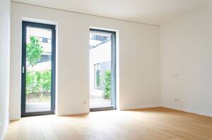 Helles Zweizimmerstudio mit Terrasse ins Grüne und Loggia mit Südausrichtung // Community-Spaces