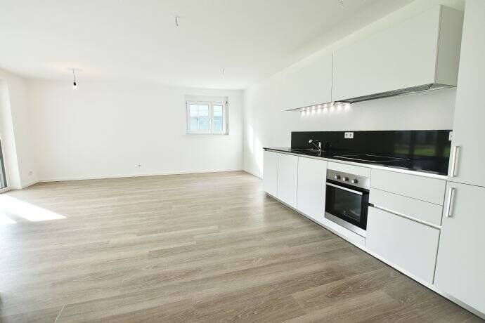 Moderne 2.5-ZWG mit Balkon & Einbauküche im Riedpark Lauchringen