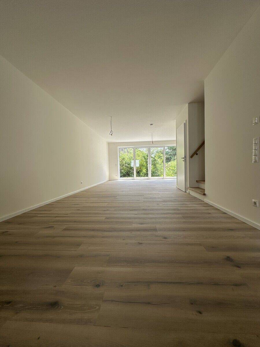 NEUBAU - Reihenmittelhaus mit Terrasse, Carport, Schuppen und Wallbox!