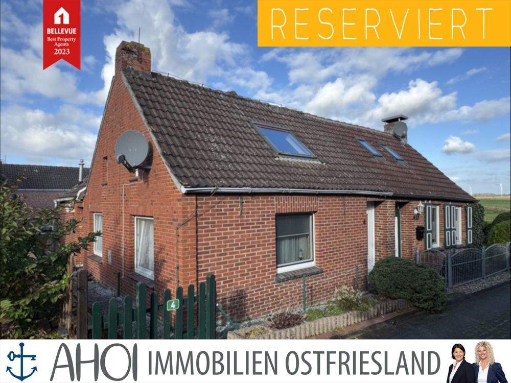 Wohnen auf der Warft: Doppelhaushälfte mit Terrasse, Carport & Garten – Krummhörn – Bild 1 von 9