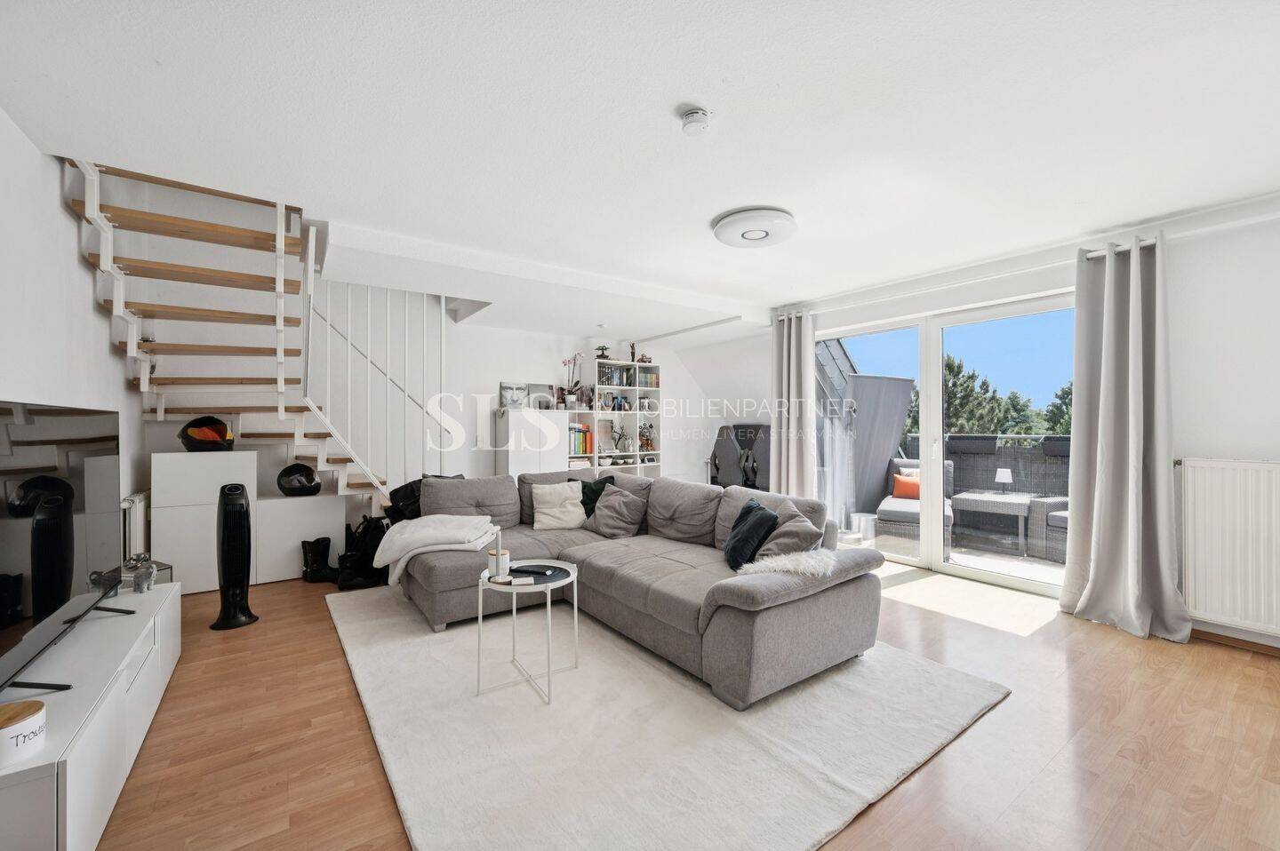 Investieren in Wohnqualität: Maisonettewohnung mit Dachterrasse und stabiler Vermietung