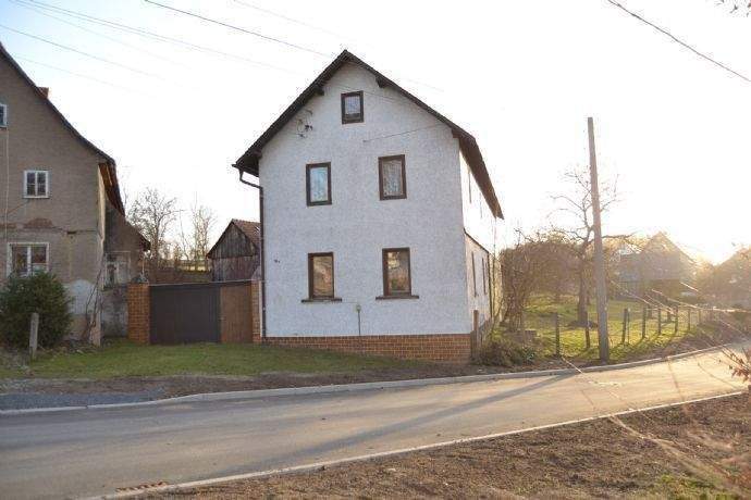 Einfamilienhaus mit Nebenräumen, großer Scheune, Nebengebäude und einer Gartenlandschaft mit vielen Möglichkeiten - Reitzengeschwenda – Drognitz – Bild 1 von 9