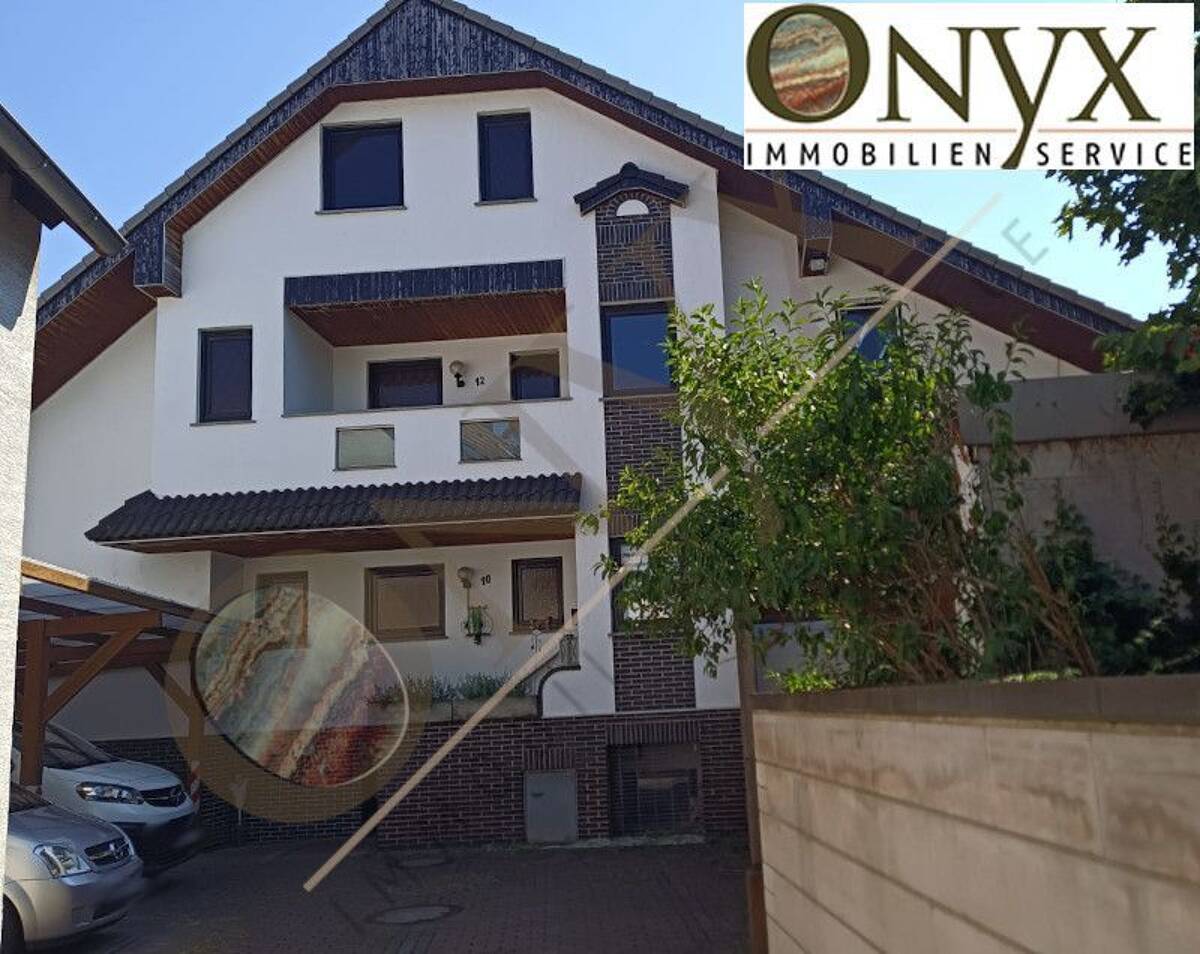 AUSSERGEWÖHNLICH und GROSSZÜGIG - 4 Zimmer, Einbauküche, 3 Balkone, tolles Bad; optimal für Eltern mit 2 Kindern – 64839 Münster – Bild 1 von 9