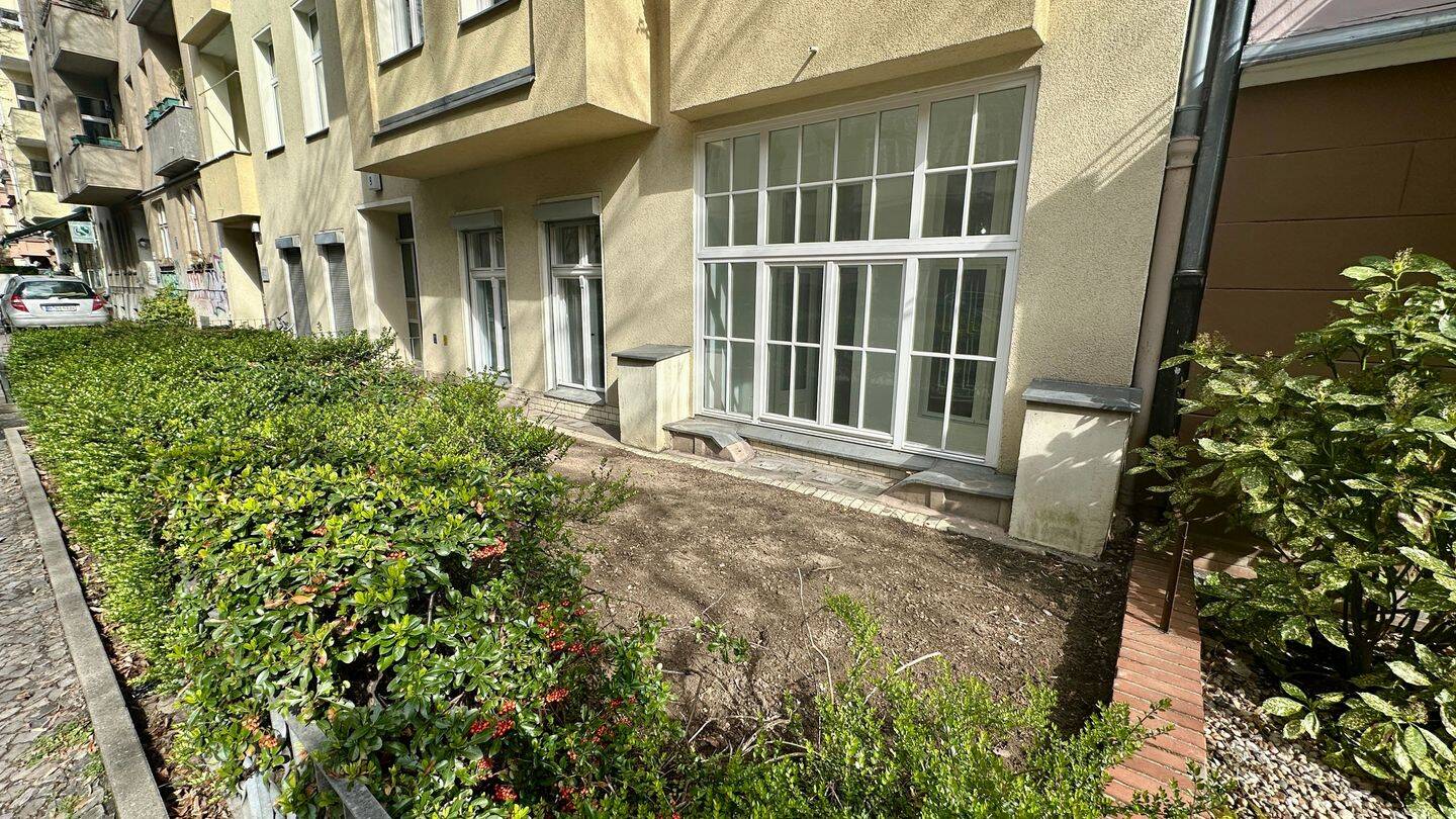 4-Zimmer Erdgeschoß mit Wintergarten und Gartensondernutzung nähe Schloßstraße