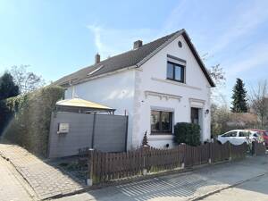 PURNHAGEN-IMMOBILIEN - Gepflegtes 3-Familienhaus auf großem Grundstück in ruhiger Lage von Fähr-Lobbendorf! – 28755 Bremen – Vorschaubild 2