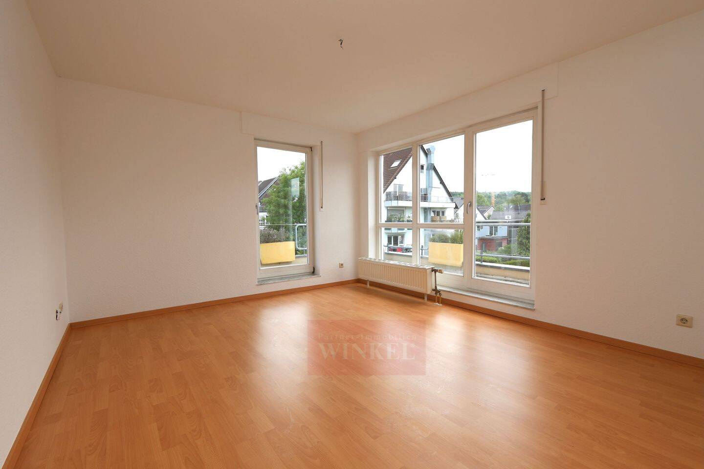 Lichtdurchflutete 2-Zimmerwohnung mit Balkon, EBK u. TG-Platz zur Eigennutzung
