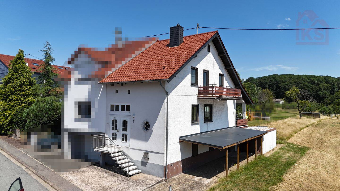 Gepflegte Doppelhaushälfte mit Garage, Terrasse und einem großem Garten in Heusweiler-Holz