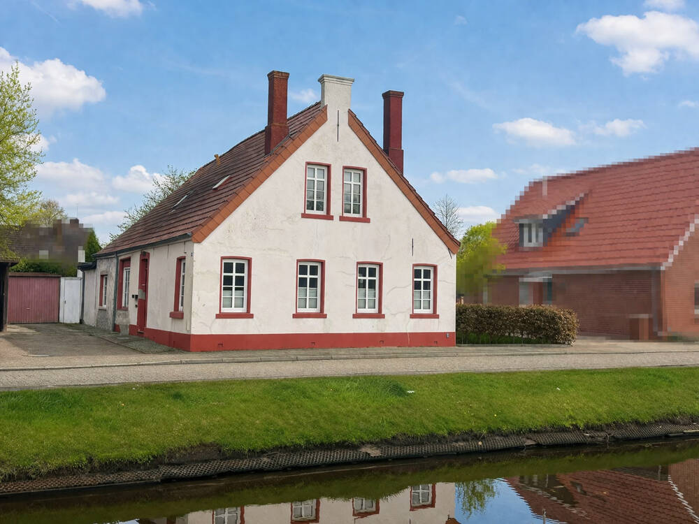 *Charmanter Putzbau in ruhiger Kanallage von Papenburg-Obenende* – Papenburg – Bild 1 von 9